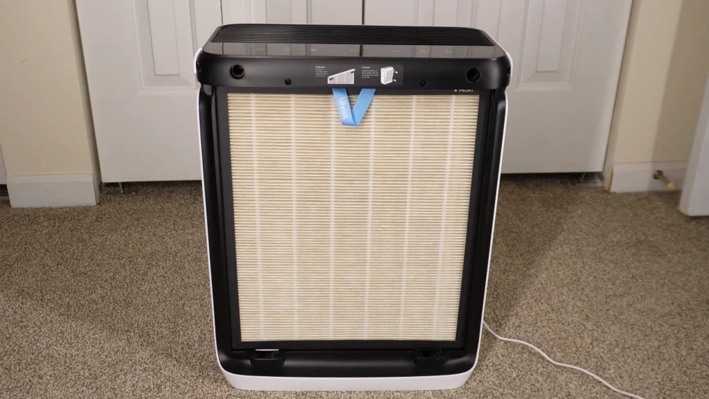 Levoit Vital 200S air purifier in a living room with a cat